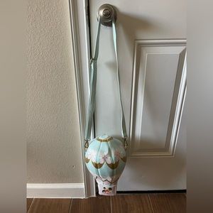 It’s a small world Disney purse